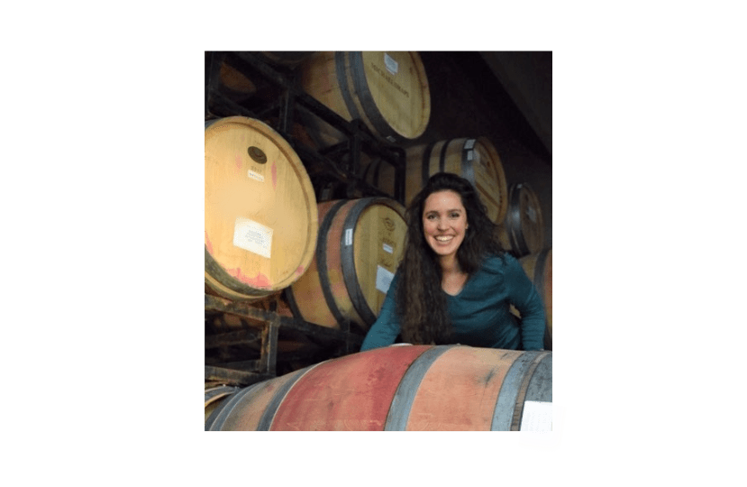 Audrey collecting wine barrel samples