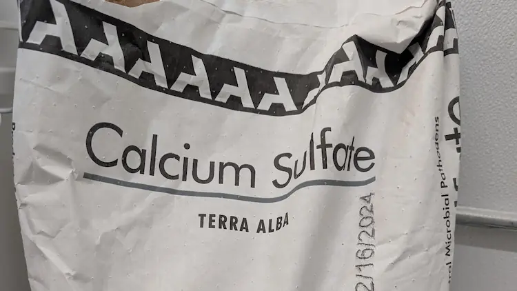 A bag of calcium sulphate/gypsum for use in food production.